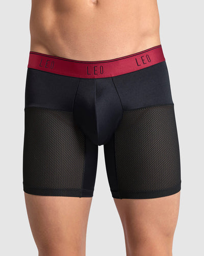 boxer-medio-de-secado-rapido-con-mallas-transpirables#color_b15-negro-con-elastico-rojo