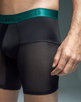boxer-medio-de-secado-rapido-con-mallas-transpirables#color_b17-negro-con-elastico-verde-oscuro